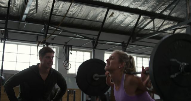 Strong Woman Lifting Weights with Personal Trainer at Gym - Download Free Stock Images Pikwizard.com