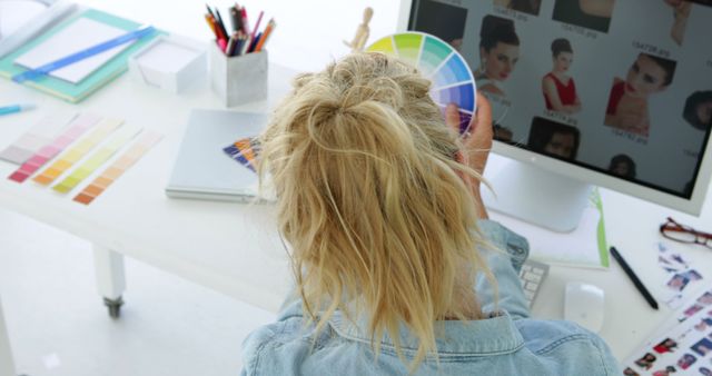 Female Graphic Designer Working on Computer with Color Swatch - Download Free Stock Images Pikwizard.com