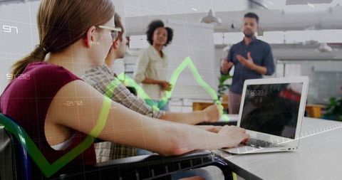 Multicultural team collaborating in modern office with financial chart overlay
