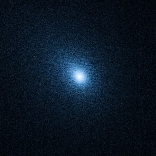 View of comet 103P/Hartley 2 as seen from Hubble Space Telescope on September 25, 2010. Useful for educational materials on space, astronomy lessons, or space exhibition displays showcasing celestial bodies and their study.