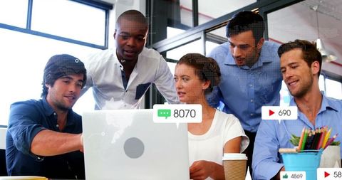 Team Analyzing Social Media Metrics for Business Strategy