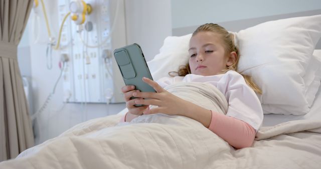 Child in Hospital Bed Using Smartphone for Companionship - Download Free Stock Images Pikwizard.com