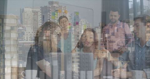 Diverse Team Discussing Financial Data Overlaid on Urban Cityscape - Download Free Stock Images Pikwizard.com