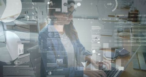 Businesswoman analyzing financial data on laptop with digital charts