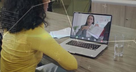Joining remote video meeting on laptop in boardroom with collaboration overlays