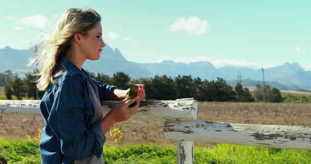 Tranquil Moment of Woman Enjoying Scenic Countryside View - Download Free Stock Images Pikwizard.com