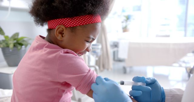 Little Girl Receiving Vaccination at Clinic - Download Free Stock Images Pikwizard.com