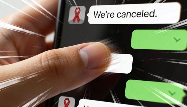 Thumb pressing smartphone screen showing canceled text with dramatic radial streaks