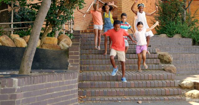 Group of Diverse Children Running Down Brick Steps Outdoors - Download Free Stock Images Pikwizard.com