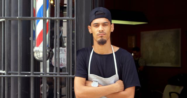 Confident Barber Standing Outside His Barbershop with Arms Crossed - Download Free Stock Images Pikwizard.com