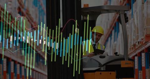 Warehouse Forklift Operator Using Tablet for Inventory Analysis
