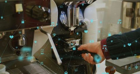 Barista using smart espresso machine with iot connectivity