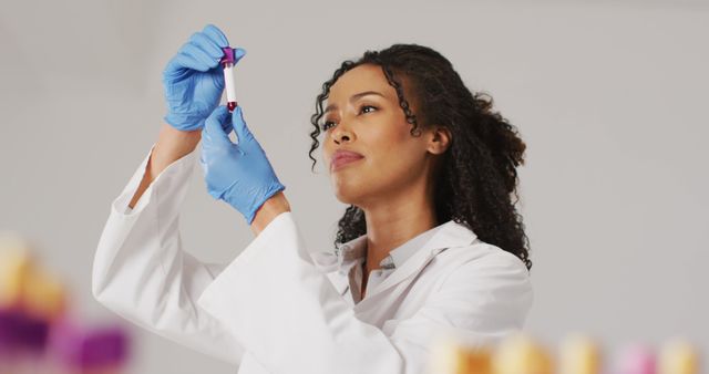 Female Scientist Analyzing Serum Sample in Laboratory - Download Free Stock Images Pikwizard.com