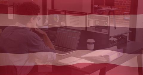 Business analyst exploring data charts on computers