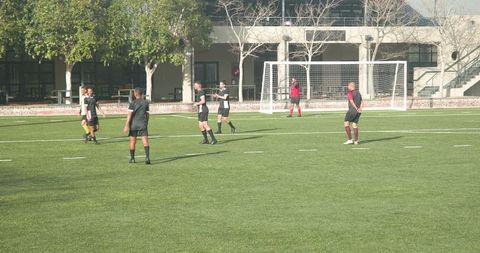 Team Preps Strategically for Soccer Showdown on Sunny Pitch