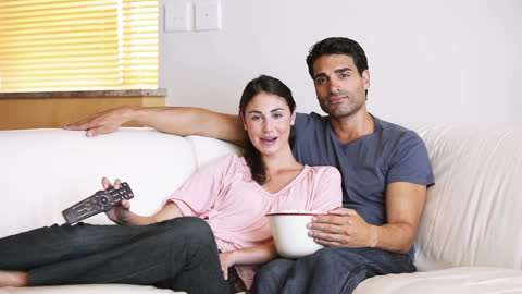 Casual Couple Enjoying Movie Night at Home