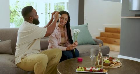 Couple Celebrates Anniversary With Gift at Home