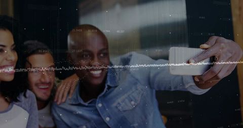 Smiling friends taking selfie with smartphone and digital waveform overlay in cafe