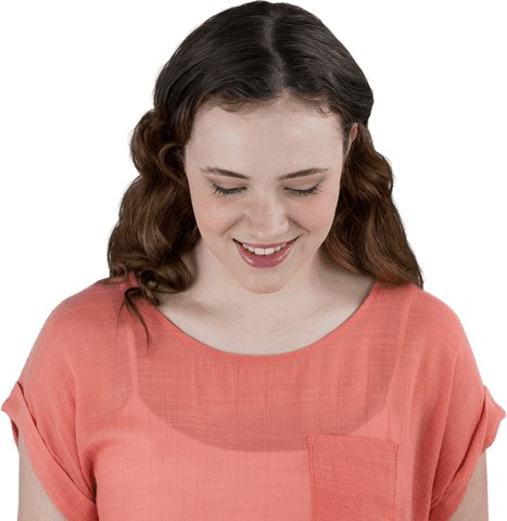 smiling woman in coral top looking down relaxed expression transparent background - Download Free Stock Videos Pikwizard.com