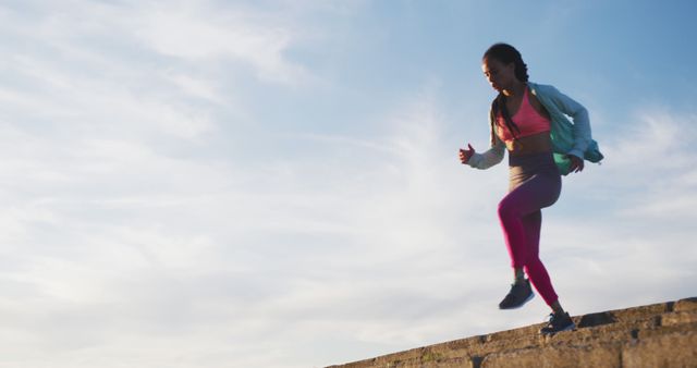 Urban female athlete running outdoor at sunrise - Download Free Stock Images Pikwizard.com