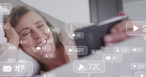 Mature Woman Reclining with Tablet and Social Media Overlay