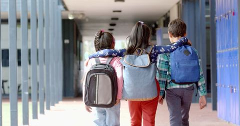 Children with Backpacks Walking in School Hallway - Download Free Stock Images Pikwizard.com