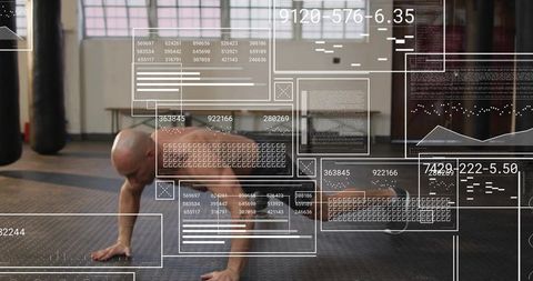 Shirtless athlete doing push-ups in boxing gym with digital hud fitness analytics overlay