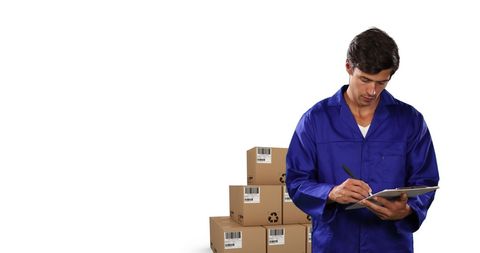 Warehouse Worker Reviewing Shipping Orders - Download Free Stock Images Pikwizard.com