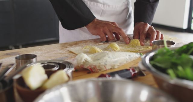 Chef Preparing Fresh Pasta Dough with Flour and Ingredients on Wooden Table - Download Free Stock Images Pikwizard.com