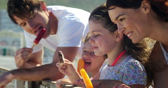 Family Enjoying Colorful Popsicles on Summer Day Outdoors - Download Free Stock Images Pikwizard.com