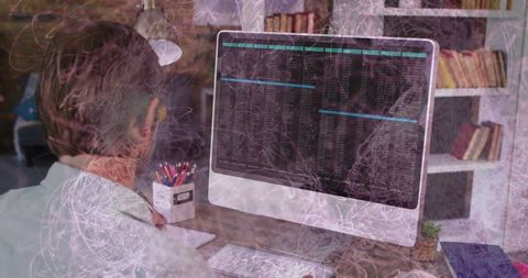 Programmer coding at minimalist home workspace with technology overlay