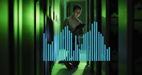 Technician Analyzing Data with Futuristic Technology Overlay