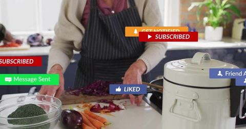 Mature woman chopping red cabbage and carrots at kitchen counter with social media overlays