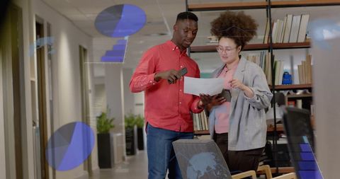 Collaborative Team Analyzing Data in Modern Office Environment