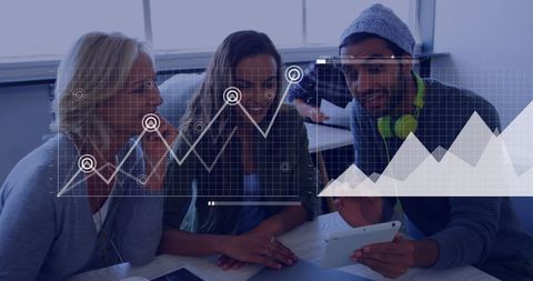 Diverse Team Analyzing Financial Graph With Technology