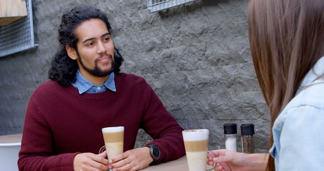 Two People Conversing Over Coffee in Cozy Café - Download Free Stock Images Pikwizard.com