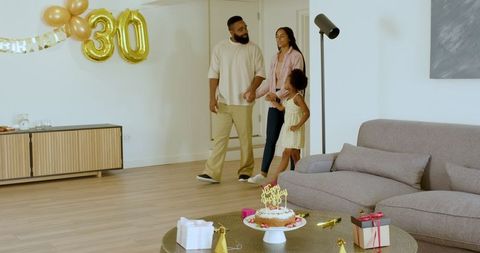 Family Celebrating Birthday at Home in Festive Atmosphere