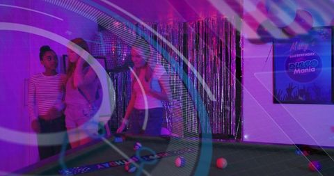 Neon disco pool party friends leaning over billiards table celebrating nightlife vibes