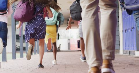 Teacher and Diverse Students Running at School for Excitement - Download Free Stock Images Pikwizard.com