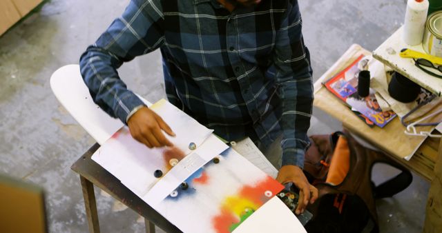 Person Assembling Custom Skateboard on Workshop Table - Download Free Stock Images Pikwizard.com