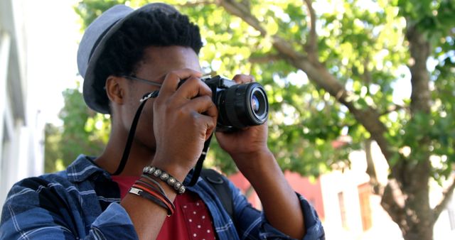 Young Photographer Capturing Outdoors with Vintage Camera - Download Free Stock Images Pikwizard.com