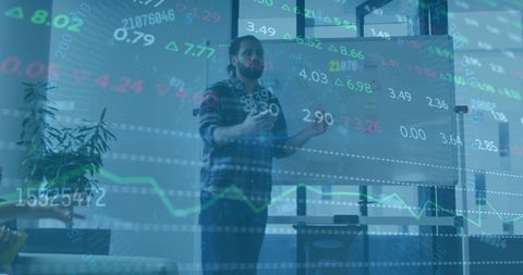 Businessman Analyzing Digital Financial Analytics in Office