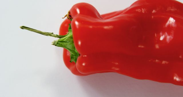 Close-up of Bright Red Bell Pepper on White Background - Download Free Stock Images Pikwizard.com