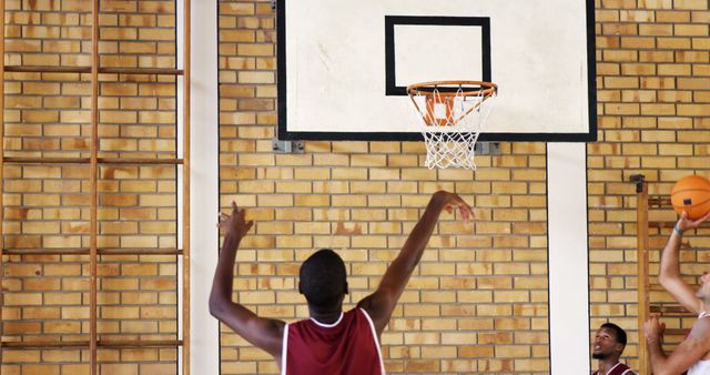 Teens Playing Basketball in Indoor Gymnasium - Download Free Stock Images Pikwizard.com