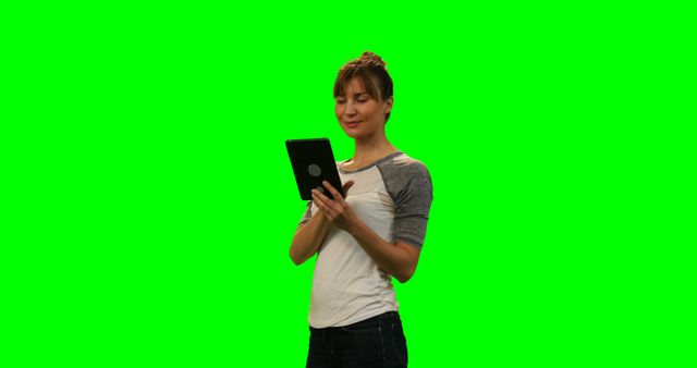 Woman Using Tablet with Green Screen Background - Download Free Stock Images Pikwizard.com