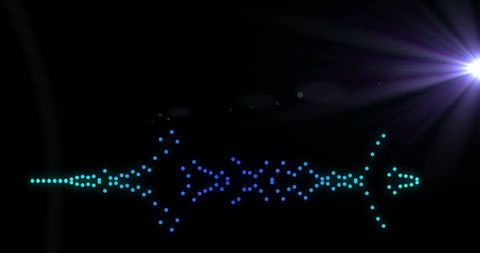 Vibrant sound waves forming with dots and lens flares on black