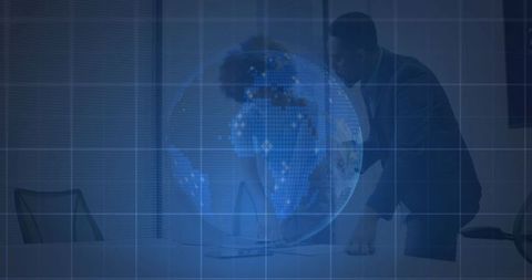 Business Professionals Engaging with Holographic Globe in Modern Office