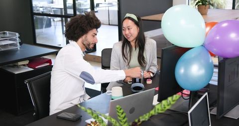 Colleagues Celebrating in Office with Coffee and Cake