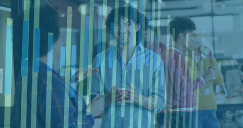 Young professionals discussing data with urban graphics overlay