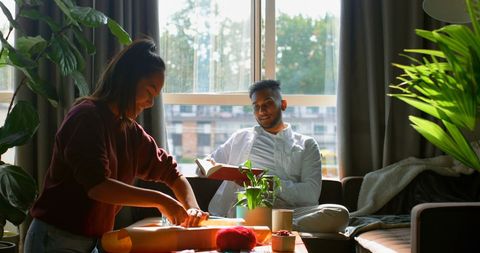 Cozy domestic scene with gift wrapping and reading